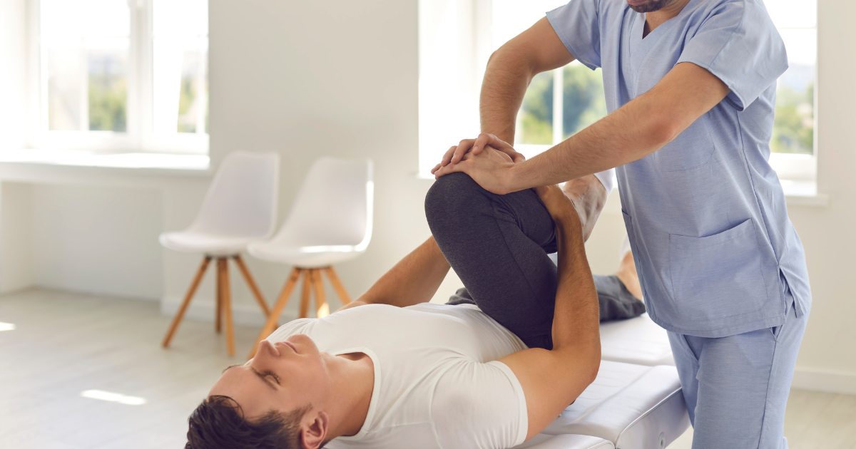 Man receiving physical therapy treatment